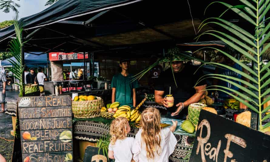 Tourists at the Puanangi Nui Market. Tourists began returning to Cook Islands in August, but then the travel bubble with New Zealand was shut down after New Zealand’s Delta outbreak.