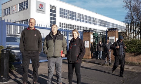 Richard Hay, Gary Reay and Vanessa Page stood before the gates of the plant as other workers leave its gates