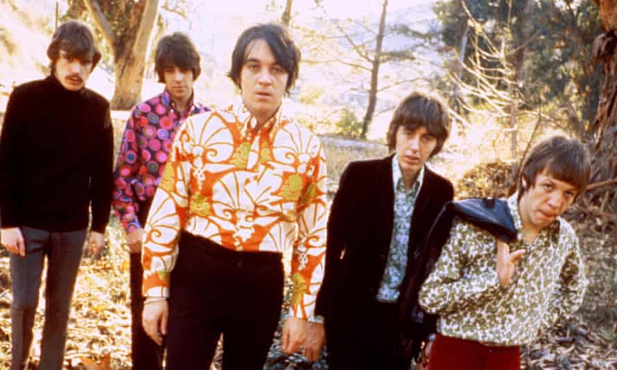 Five young men looking cool
