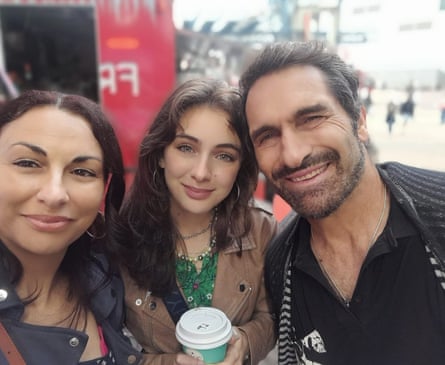 Mercury Psillakis, victim of a shark attack at Long Reef, with his wife and daughter.