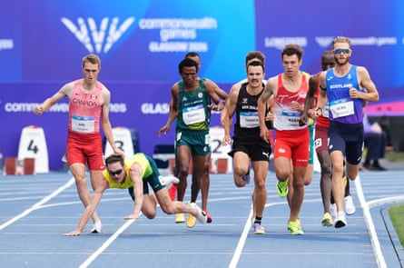 Olli Hoare falls during the men's mile heats