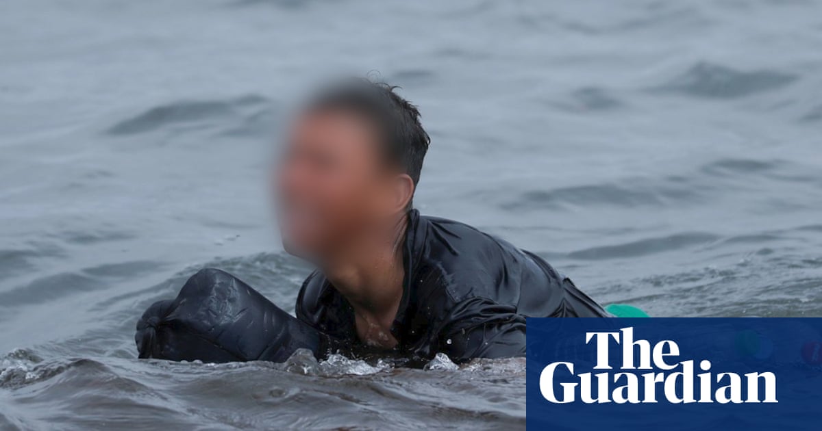 Migrant boy swims to beach in Spain’s Ceuta with plastic bottles to stay afloat – video