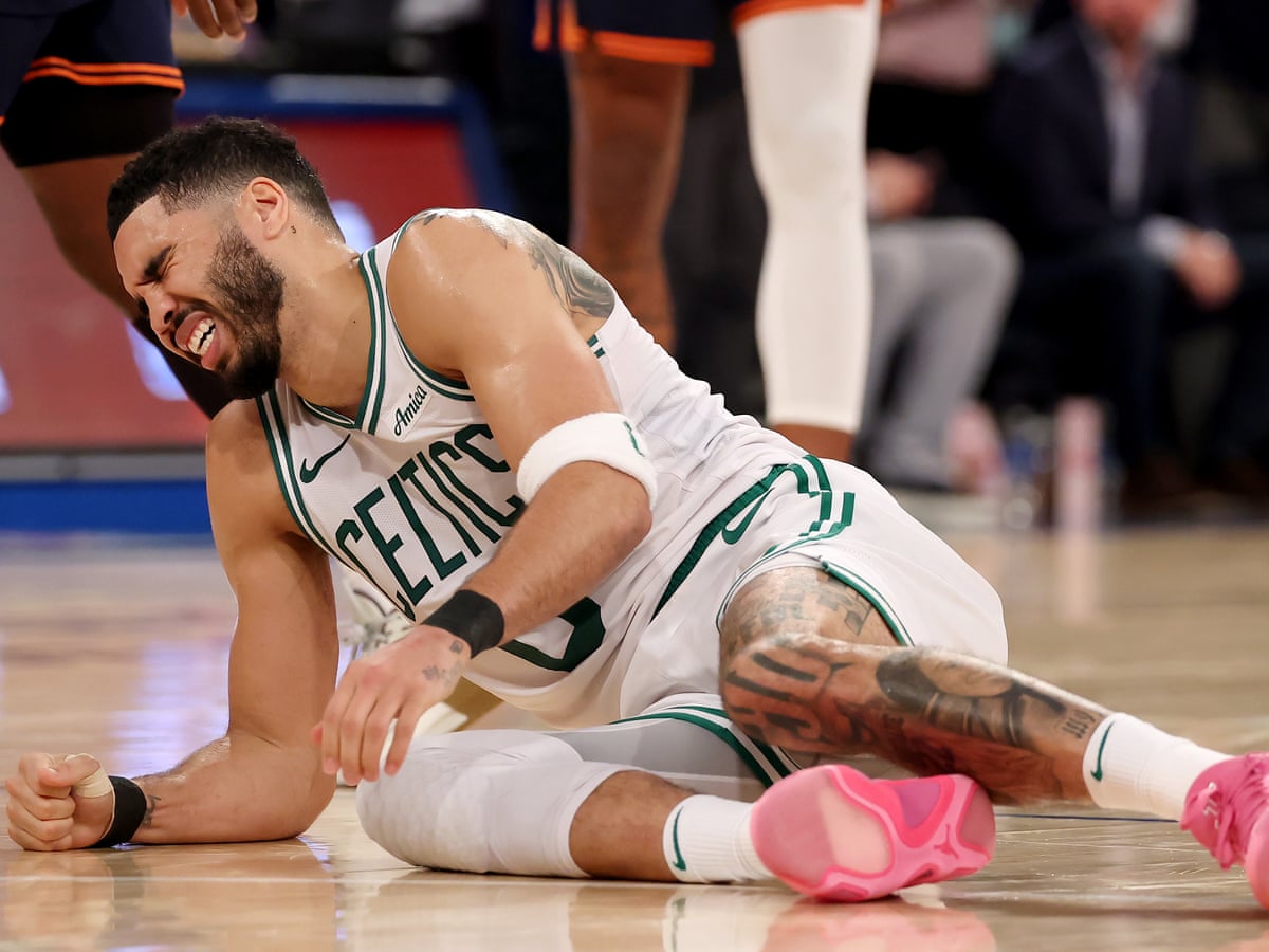 Tatum's Celtics season over with torn achilles in bitter blow to defending NBA champions | Boston Celtics | The Guardian