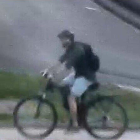 A French police handout showing the suspect on his bicycle.