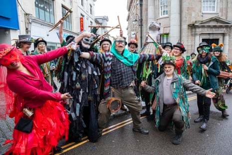 Dancers, musicians and revellers swarming on the streets of Penzance.