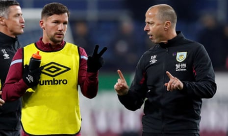 Burnley assistant manager, Ian Woan, right, was last night named by the club as one of the six Premier League staff and players who have tested positive for coronavirus