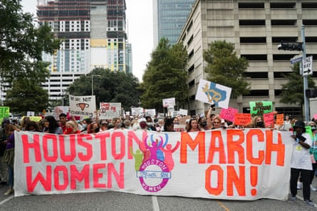 Abortion rights supporters participate in the nationwide Women’s March held on 2 October.