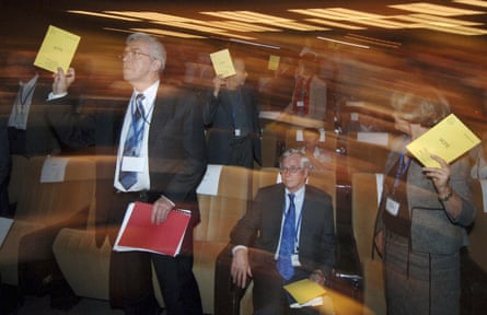 Members of the International Astronomical Union (IAU) vote on the resolution for planet definition in 2006.