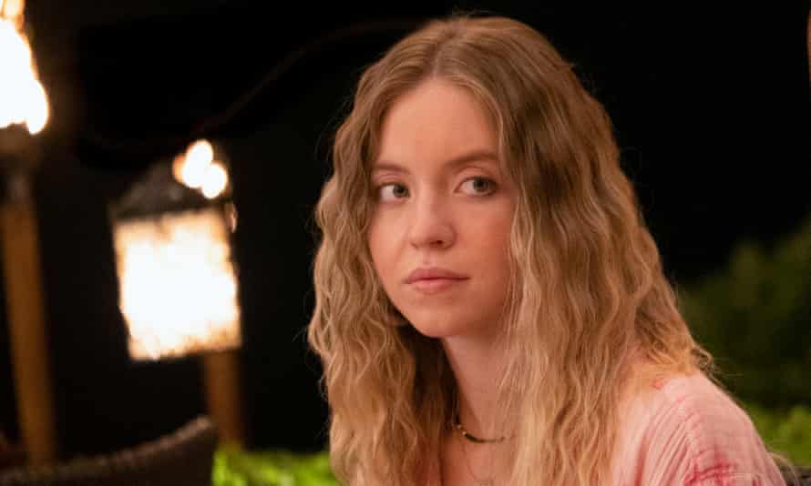 Sydney Sweeney as Olivia, in the garden