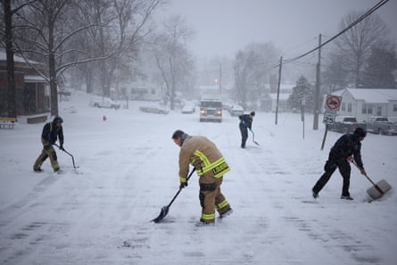 US winter storm leaves four dead as millions hit by snow, ice and bitter cold | US weather | The Guardian