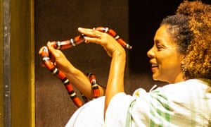 Sophie Okonedo, who stars opposite Ralph Fiennes in Antony and Cleopatra, spends a moment with milk snake Pork Pie.