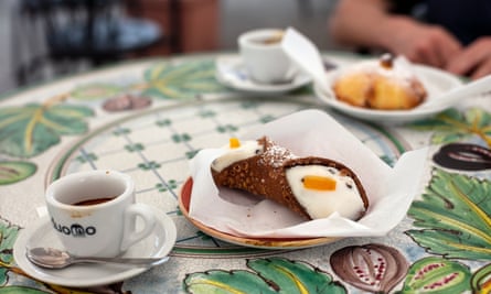 Cannoli pastries are perfect with an espresso.