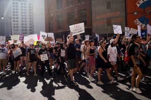 Abortion rights demonstrators march through the streets of Detroit, Michigan.