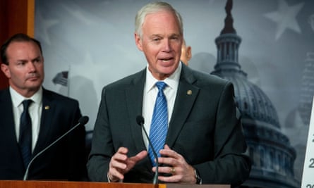 Ron Johnson speaks to reporters in Washington.