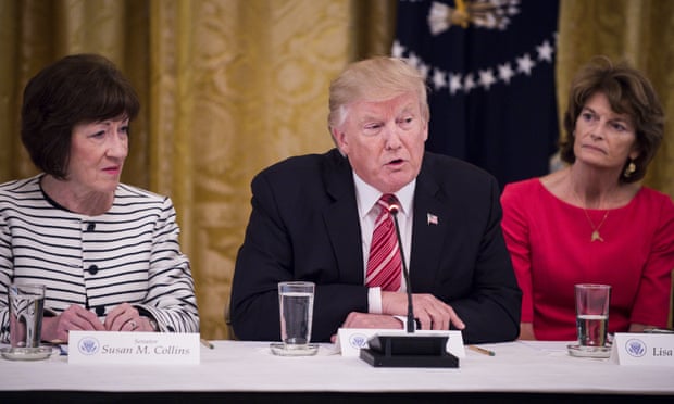 Donald Trump sits beside Republican senators Susan Collins and Lisa Murkowski, both of whom have deep reservations about the bill.