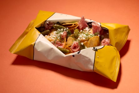 Cheese and onion Pipers crisps with cornichons, feta, dill and fennel sausage salami.