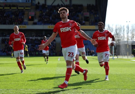 Charlie Kelman is joined by his Charlton teammates after scoring against Oxford