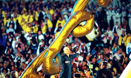 Midnight Oil performed to a global audience of billions wearing ‘Sorry’ suits, at the closing ceremony of Sydney’s 2000 Olympics.