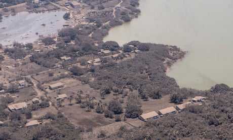 Homes and vegetation covered in ash on the island of Nomuka.