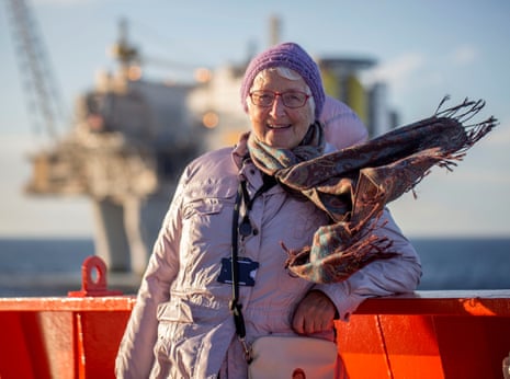 A passenger on the oil rig tour poses for a picture in the North Sea.