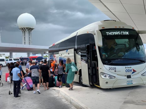Tourists arrive at the airport of the recreation center of Cancun, to take their flight back to their home country through the tourist company Thomas Cook, in the state of Quintana Roo, Mexico