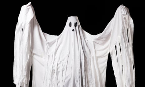 A man in a ghost costume