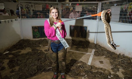 A contestant at the Miss Snake Charmer pageant poses at the 2021 rattlesnake roundup.