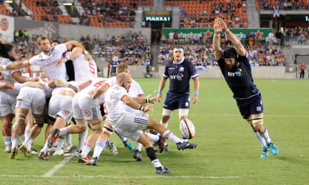 Shaun Davies, scrum-half for the Glendale Raptors and the USA, clears his lines against Scotland in Houston.