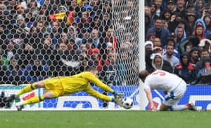 De Gea tips it wide.