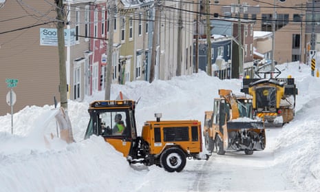 Workers with snow-clearing machinery in St John’s, Newfoundland