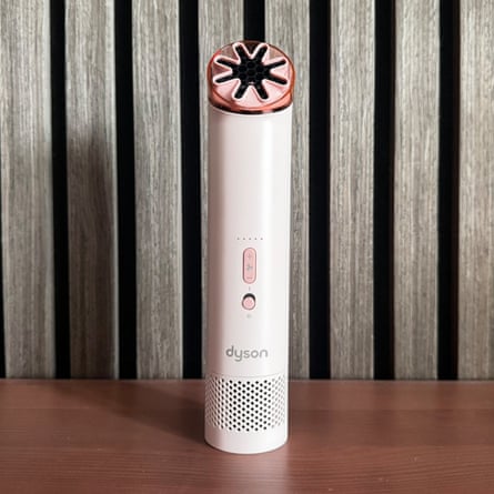 Dyson HushJet Mini Cool Fan on a wooden surface