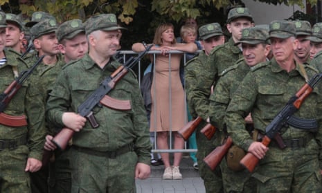 Reservists drafted in Russia’s military call-up attend a departure ceremony in Sevastopol, Crimea
