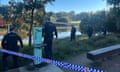 Police at the scene beside the Cooks River