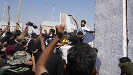 Followers of influential Shia cleric storm Iraqi government palace – video