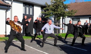 Mourners perform a haka as a hearse carrying the coffin of Matt Ratana is driven away from the funeral service in Shoreham-by-Sea, West Sussex.