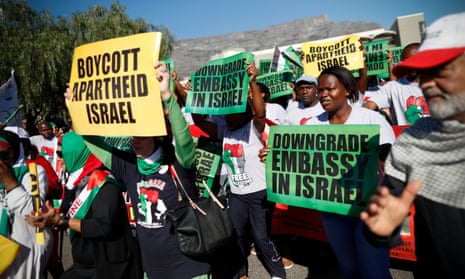 South Africans take part in a protest against Israel in Cape Town, South Africa on Tuesday. South African Jews for a Free Palestine joined the human rights and Palestine solidarity movement Boycott, Divestment and Sanctions against Israel in South Africa in marching to South Africa’s parliament in protest against the Israeli governments actions in Gaza