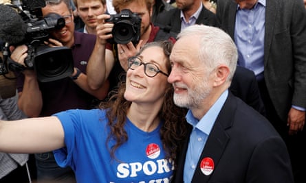 Jeremy Corbyn, leader of Britain’s opposition Labour Party, poses for a selfie at a campaign event in Reading.