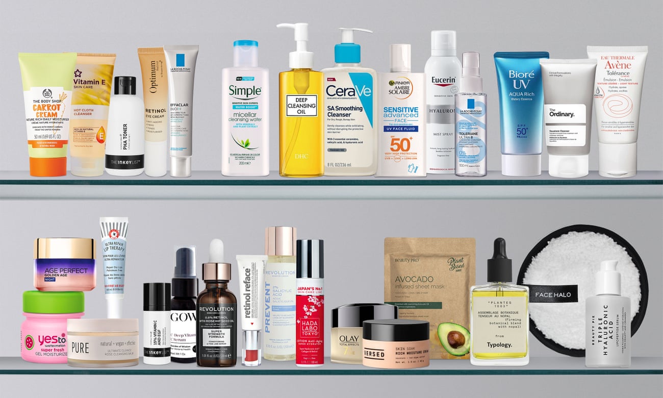 Beauty products on two bathroom cabinet shelves