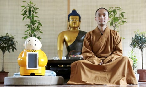 Master Xianfan with his robot monk Xian’er, at the Longquan Buddhist temple on the outskirts of Beijing.