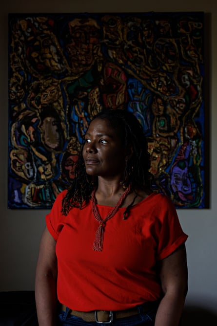 A woman in a dark room