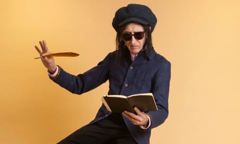 John Cooper Clarke, photographed last month with a quill and notebook.