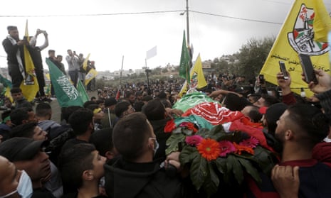 Ali Ayman Abu Aliya, 13, was buried in his home village near Ramallah after a large funeral.
