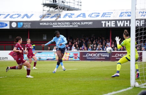 Khadija Shaw tucks the ball home for Manchester City’s second goal of the game.