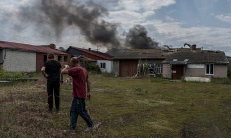 Smoke rises after shelling near the Ukraine-Russia border in the town of Vovchansk.