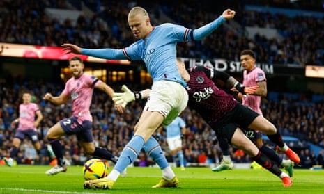 Manchester City’s Erling Haaland goes past Everton’s keeper Jordan Pickford but the angle is too tight and he shoots into the side netting.