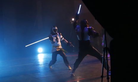 Buzzing … competitors fight it out in a national lightsaber tournament in Beaumont-sur-Oise, north of Paris.
