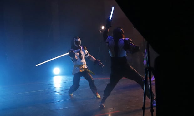 Buzzing … competitors fight it out in a national lightsaber tournament in Beaumont-sur-Oise, north of Paris.