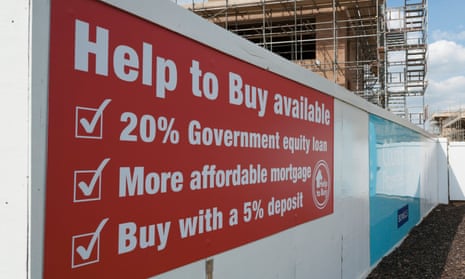 Signage at a new housing development advertises the help-to-buy scheme, which Rishi Sunak’s government is thinking of reviving.