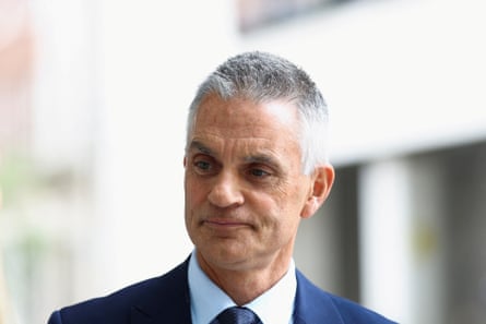 Tim Davie wearing a dark suit