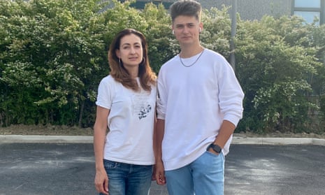 Vlad Ksheminskyi, 16, with his legal guardian and mother’s friend, Olesia Reviuk